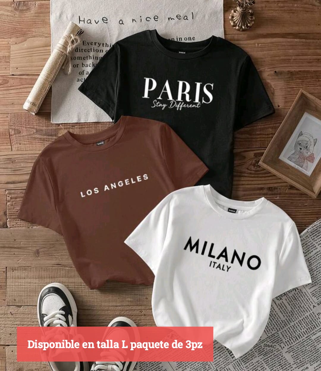 Talla: L  Incluye:  Playera negra con estampado PARIS – Stay Different  Playera café con estampado LOS ANGELES  Playera blanca con estampado MILANO – Italy  Diseño: Letras minimalistas y estilo urbano  Cuello: Redondo  Mangas: Cortas  Tela: Fresca, s
